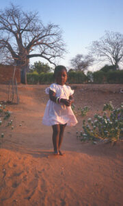 A little Chakohwa village girl, walking down a path. A color slide taken using my Pentax K1000.